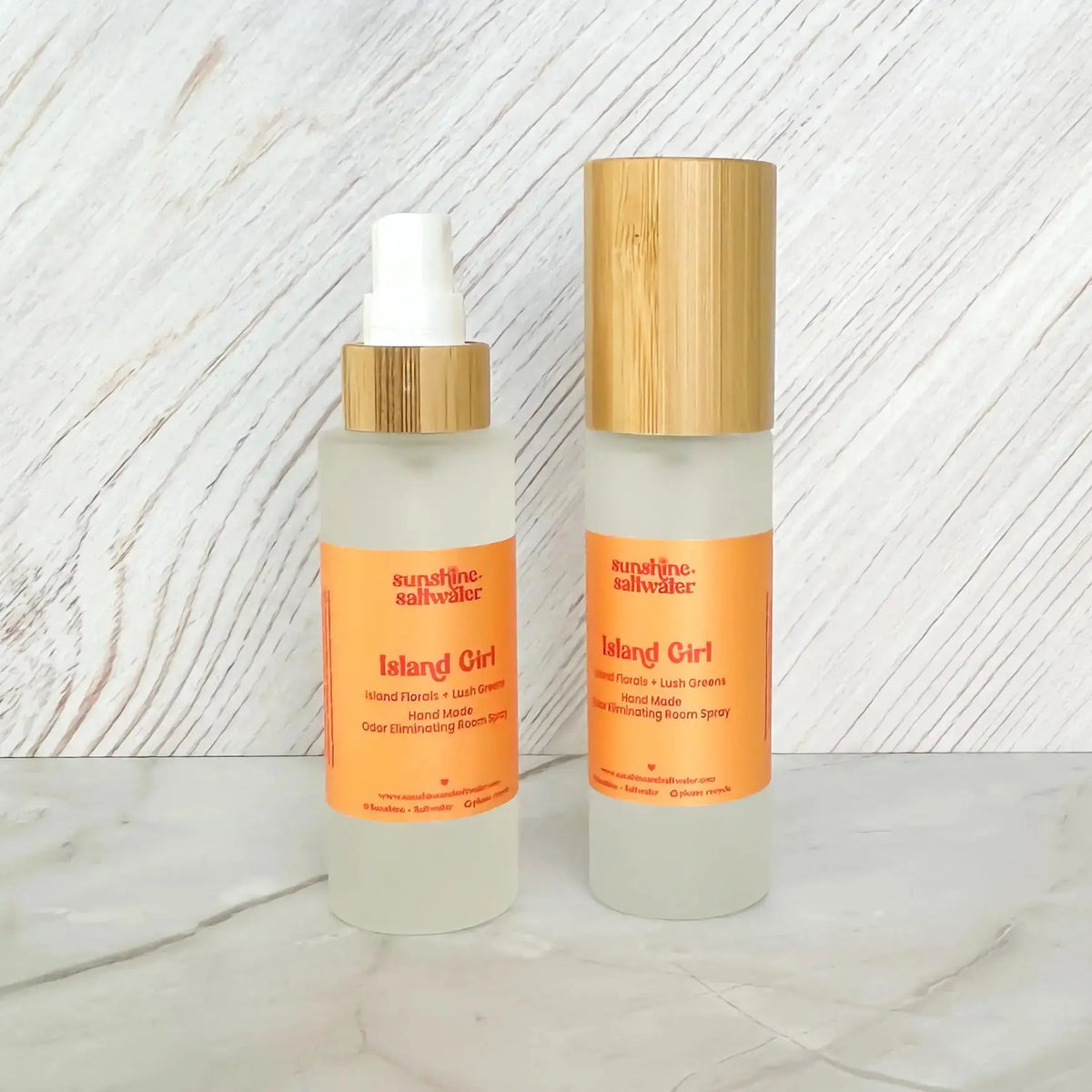 tropical room spray scent with orange label and wooden topper