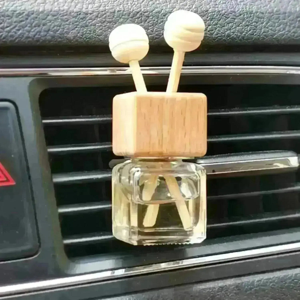 side view of car diffuser kit attached to car vent