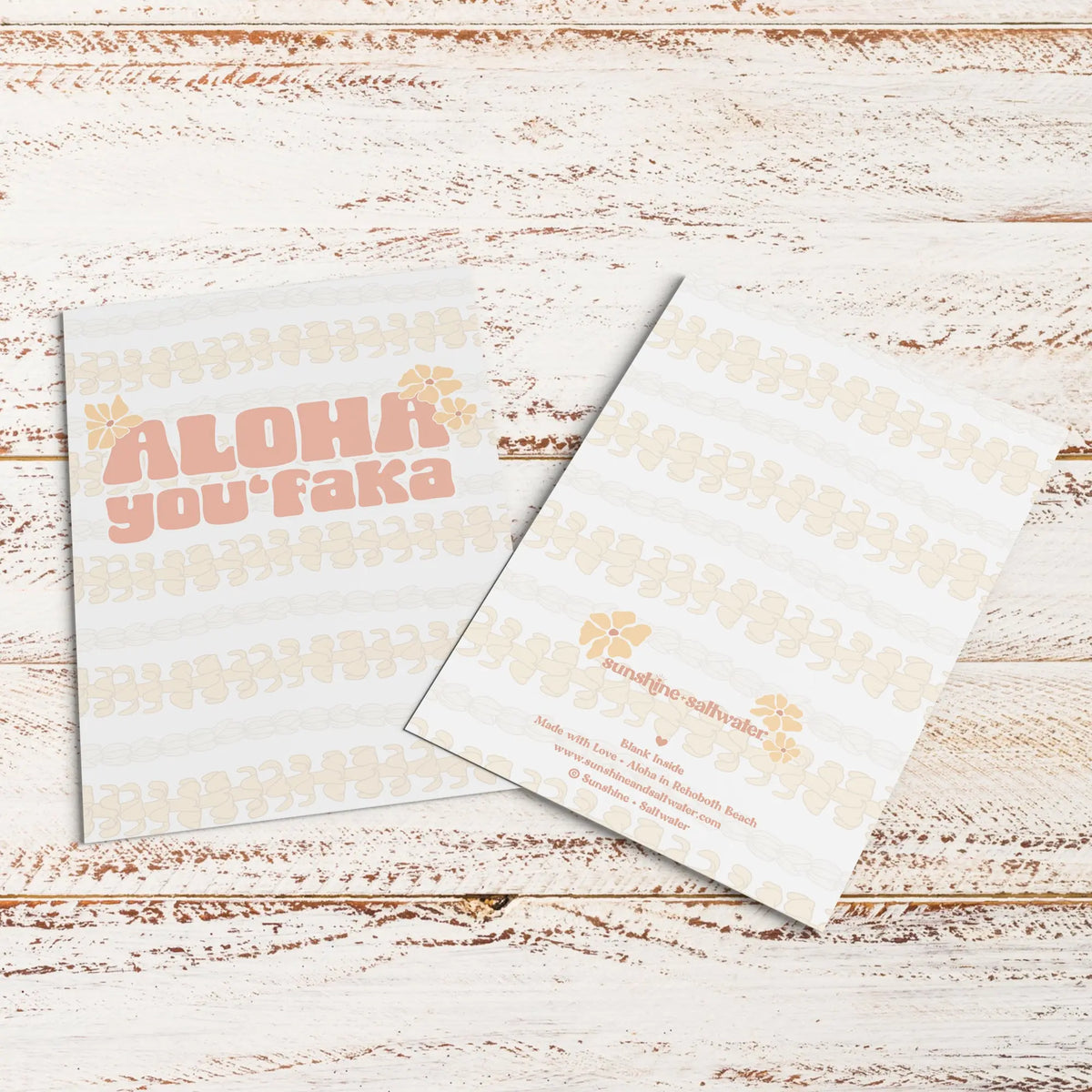 flat lay displaying front and back of aloha you'faka greeting card