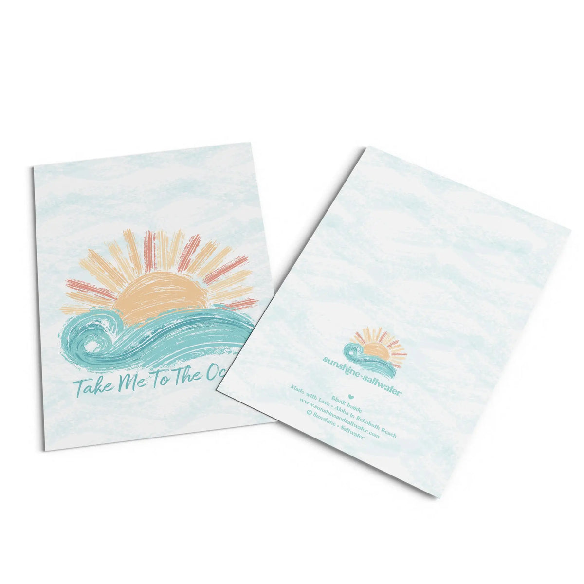 flat lay of beach themed stationary cards saying take me to the ocean