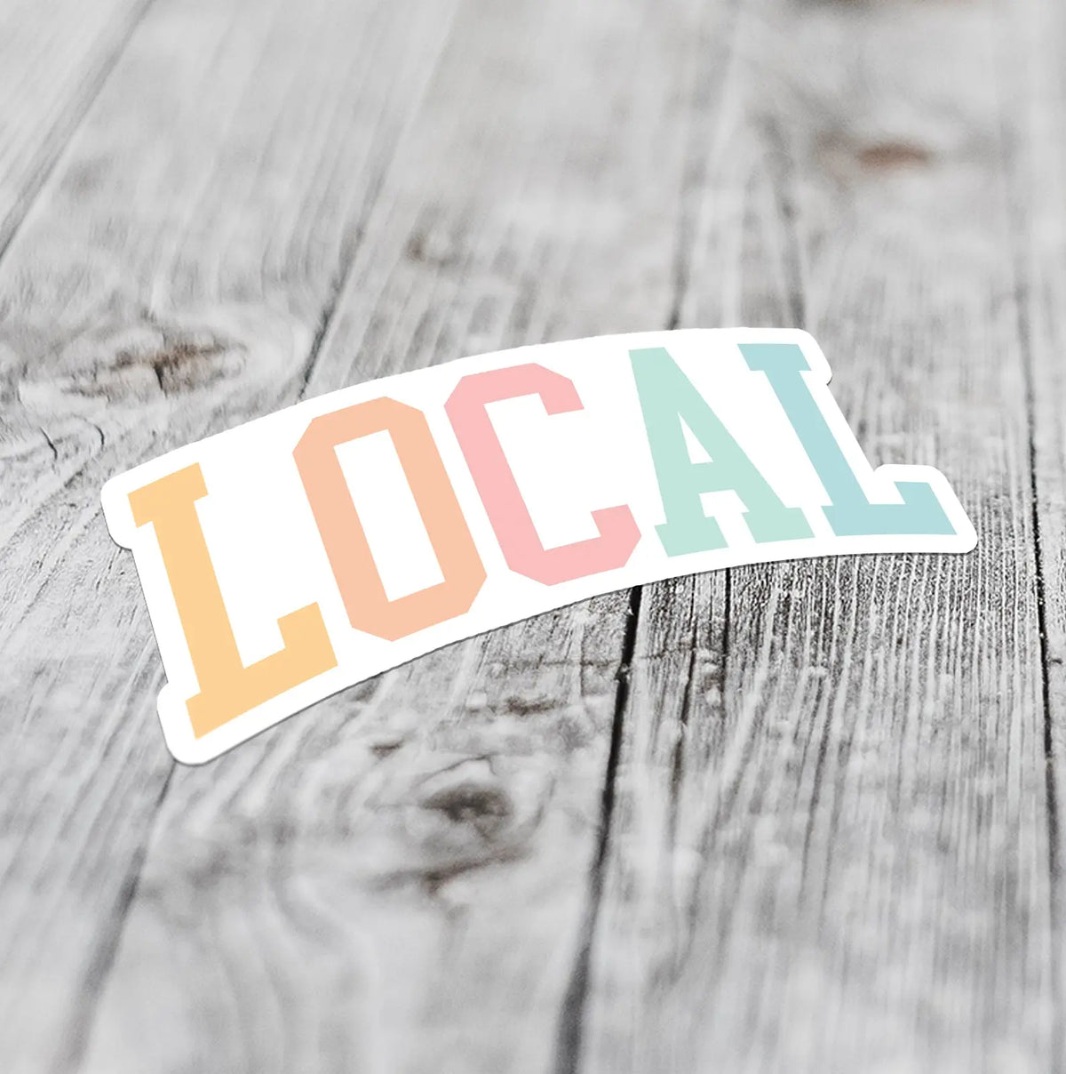 shop local sticker in colorful font